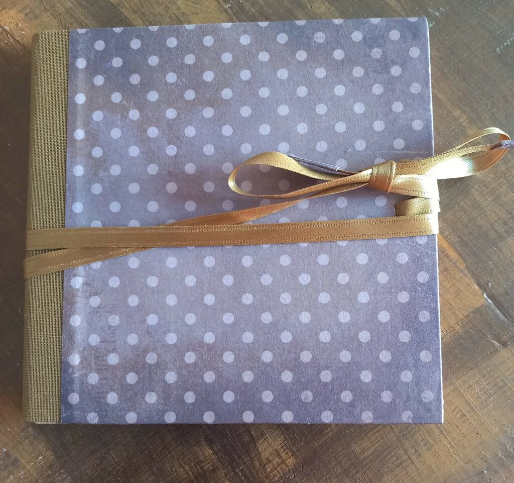 Double photo frame with ribbon ties